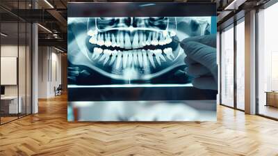 Hands doctor dentist in gloves show the teeth on x-ray on digital screen in dental clinic on light background with medical equipment. Smile healthy teeth concept, close up Wall mural