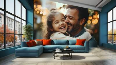 happy father hugging to his daughter and laughing Wall mural