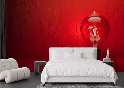 Innovative idea symbolized by light bulb on red surface Wall mural