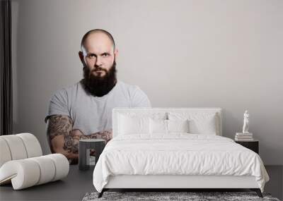 bearded man with crossed arms Wall mural