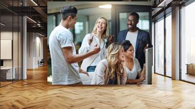 Excited, happy and celebrating marketing agents cheering after meeting goal and deadline in office late at night. Diverse creative team with successful fist hand gesture while working on a computer Wall mural