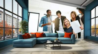 Happy, creative and cheerful business people, in marketing meeting, excited with presentation. Colleagues working on advertising ideas in modern office. Group of coworkers brainstorming together Wall mural