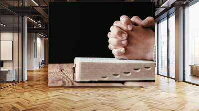 Man praying with arms crossed Wall mural