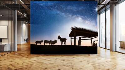 Manger in the Moonlight
A simple wooden manger under the night sky, with a beam of moonlight and starlight softly illuminating it. Wall mural