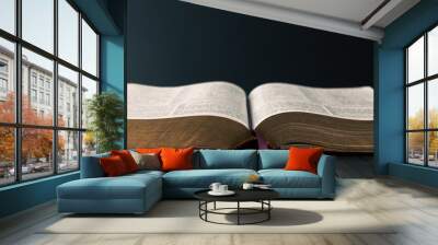 Open Holy Bible on table. Wall mural