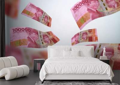 One hundred thousand rupiah banknote flying on a white background. Uang kertas seratus ribu Wall mural