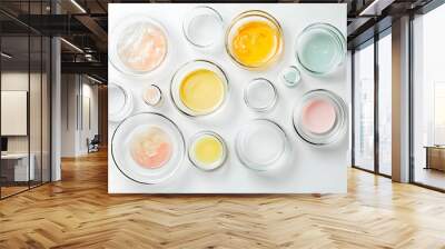 Petri dishes with different cosmetic products on white background, flat lay Wall mural