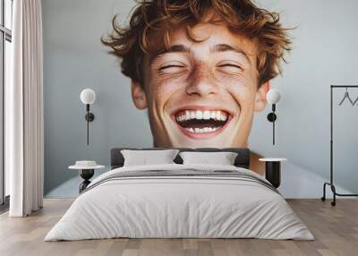 portrait of laughing man with big tooth gap, short hair and freckles, Wall mural