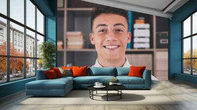 Portrait of one young and happy cheerful man smiling looking at the camera having fun. Headshot of male person working at home in the office.. Wall mural