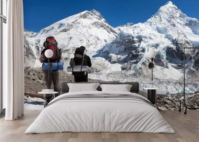 Mount Everest, Lhotse and Nuptse with two tourists Wall mural