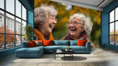 Senior, women and friends have fun  in park and retirement smile in a garden. Nature, holiday and conversation with elderly female people on vacation feeling happy  Wall mural