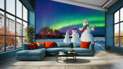 Snowman Family Under the Northern Lights Wall mural