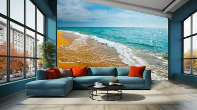 Soft blue ocean wave on clean sandy beach Wall mural