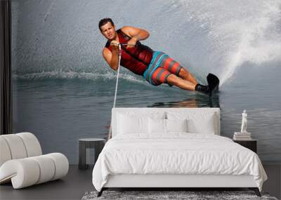 A slalom waterskier turning hard Wall mural