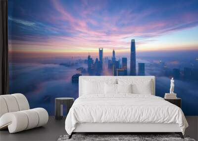 The clouds in the city, light blue and pink colors, distant view of high-rise buildings, at dusk Wall mural