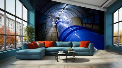 illuminated gas or oil, orange pipeline in dark tunnel Wall mural