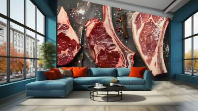 Variety of Raw Black Angus Prime meat steaks T-bone, tomahawk, New York steak. Set raw marbled beef strip loin steaks. place for text, top view Wall mural