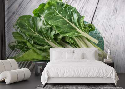 Fresh organic chard on a rustic background Wall mural