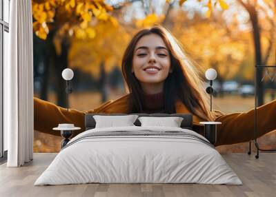 woman in autumn park Wall mural