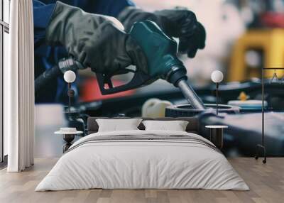 Car mechanic hands changing the fuel filter in garage Wall mural