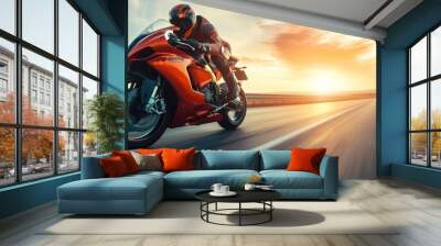 Motorbike rider in sunset light riding with high speed Wall mural