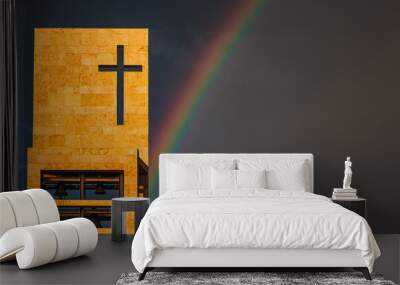 a rainbow above a modern church tower with christian cross, image with copy-space, banner Wall mural