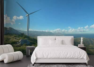 Wind turbine on a hillside captured during a clear day Wall mural