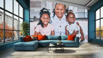 Black children, portrait and senior grandmother on sofa with quality time with love in family home. Kid, together and happy face on couch with elderly female with care in lounge with smile. Wall mural