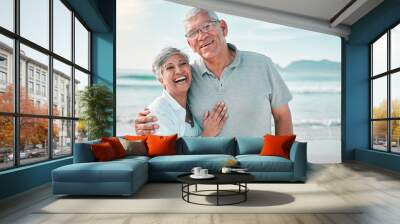 Happy, hug or portrait of old couple on beach with love, care or support on summer vacation holiday in nature. Retirement, mature man or senior woman at sea or ocean to travel on holiday together Wall mural