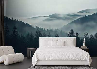 Forested mountain slope in low lying cloud with the conifers shrouded in mist in a scenic landscape Wall mural