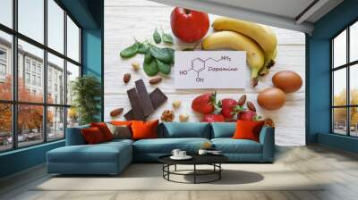 Foods rich in dopamine with structural chemical formula of dopamine molecule. Assortment of healthy food for good mood and happiness. Dopamine-boosting foods. Wall mural