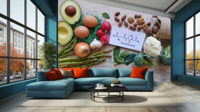 Foods rich in glutathione with structural chemical formula of glutathione. Healthy foods to boost glutathione. Glutathione is a tripeptide (protein), it acts as an antioxidant. Wall mural