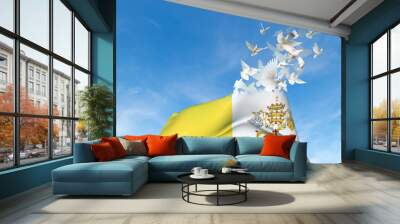 Two hands are holding a Vatican flag which morphs into birds while waving against a blue sky background. 3D Illustration. Wall mural