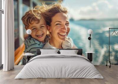 A boy and his mother stand on the deck of the ship and look at the sea. Wall mural