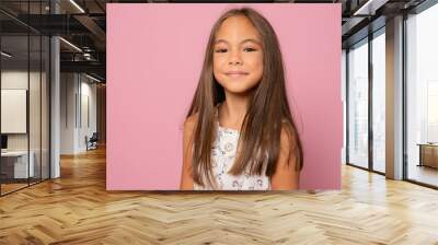 closeup portrait beautiful smiling girl isolated over pink background. Wall mural