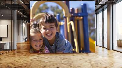 Portrait of two children playing on the playground Wall mural