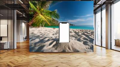 Mobile phone mockup with blank screen on the white sand on the tropical beach with blue wate  Wall mural