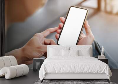 Mockup image of mobile phone for advetising. Mock up image of person hand holding  Wall mural