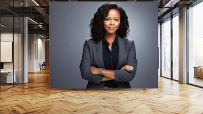 portrait of young african businesswoman looking at camera smiling. Wall mural