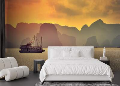 Halong bay boats,Sunset at Ha Long Bay scenic view , Hanoi, Vietnam , Southeast Asia Wall mural