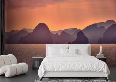 Halong bay boats,Sunset at Ha Long Bay scenic view , Hanoi, Vietnam , Southeast Asia Wall mural