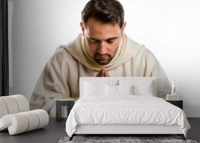 Devout Clergyman in Prayerful Pose Wearing Liturgical Vestments Isolated on White Wall mural