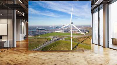 Aerial drone view of the port of Zeebrugge at the coast of Belgium, Europe.  Ro-Ro of new cars for import - export cargo around the world. Powerd by wind turbines. Wall mural