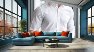 Crisp button-down shirt in a light color, offering a polished and professional appearance. Wall mural