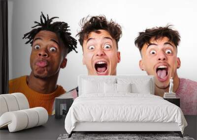 Young men making funny faces against a clean white background. Wall mural