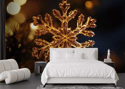 A delicate crystal snowflake ornament sparkles with soft lights, hanging beautifully on a Christmas tree, creating a festive holiday atmosphere. Wall mural