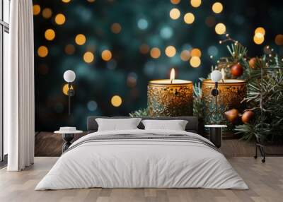 Christmas candles and fir branches on wooden table, closeup. Wall mural