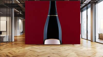 Black Champagne bottle with mock up on red background.Greeting card for love, marriage, Valentine's Day,birthday,celebrations and festivities. Wall mural