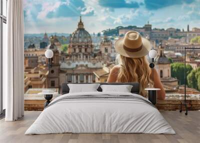 Blonde woman in hat admiring rome city view from balconytravel and tourism concept Wall mural