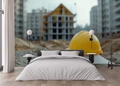 Construction site photography  house repair work with drawings and yellow helmet in focus Wall mural